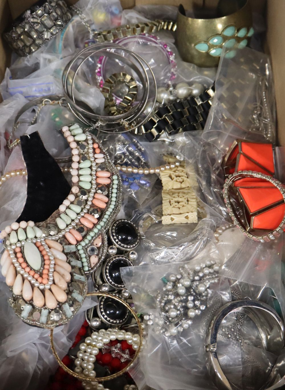 A large group of assorted costume jewellery.